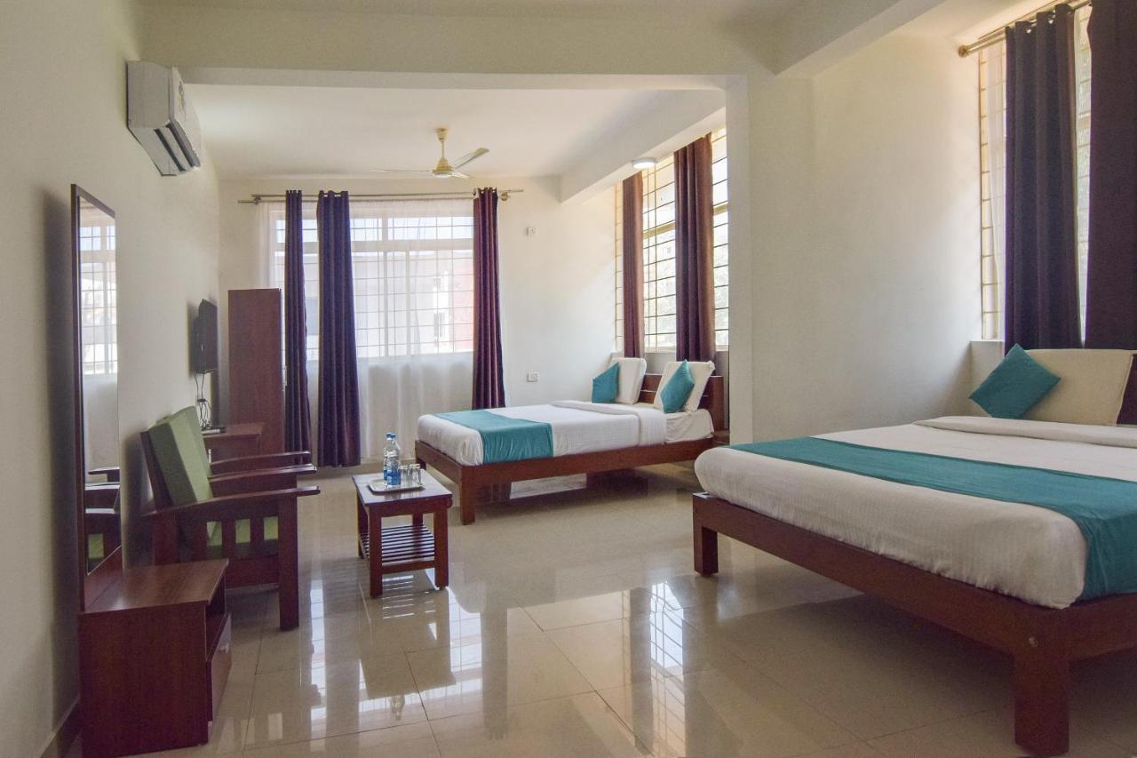 Capital O 14144 Hotel Moriz Madikeri Extérieur photo