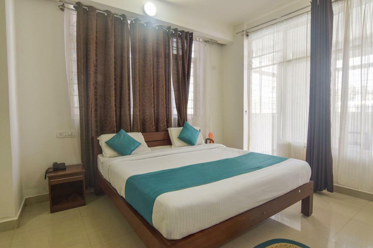 Capital O 14144 Hotel Moriz Madikeri Extérieur photo